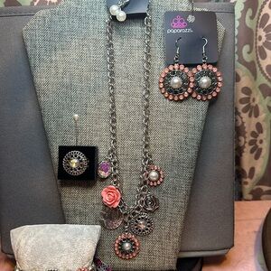 4 piece paparazzi fashion fix set glimpses of Malibu. Peach, iridescent, pearls.